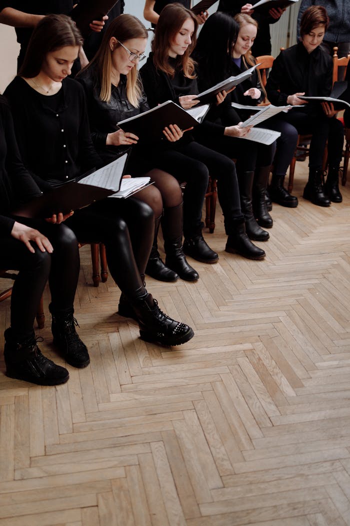 Women in Black Clothes Reading